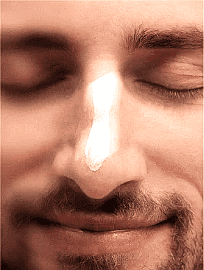 Applying nourishing day cream for sensitive skin